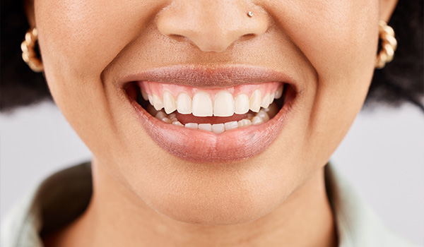 close up of a smiling woman showing healthy white teeth perfect oral health care tips 4