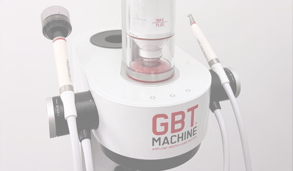 a Guided Biofilm Therapy machine with airflow handpiece and ultrasonic scaler